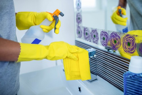 Cleaner preparing a room for professional cleaning service